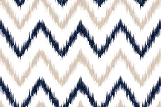 Beige & Navy Ikat Chevron on White &ndash; refined tribal-inspired geometric seamless pattern for fabric, stationery, home furnishings, wallpaper, and creative backgrounds.