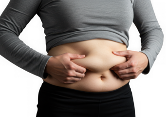 Woman pinching excess belly fat