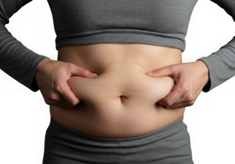 Person pinching excess belly fat with fingers