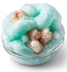 Obraz premium Light-blue, foamy dessert in a glass bowl, with embedded pale-pink fruit pieces