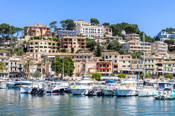 Naklejka premium Port de Soller town on Mallorca island marina with yacht boats vacation by the sea in Spain