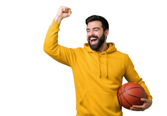 Excited man celebrating victory with a basketball isolated on a transparent background