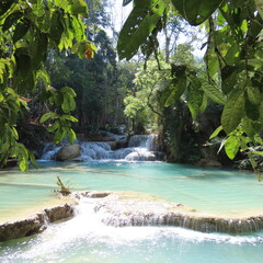 romantic turquoise water, small waterfall in the jungle