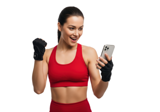 Excited fitness woman celebrating on her smartphone isolated on a transparent background

