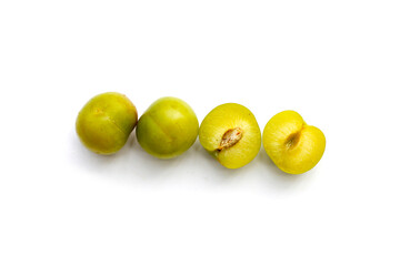 Fresh green plum fruit on white background.