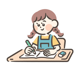 Girl writing in a notebook at a desk