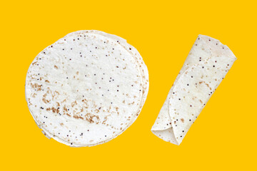 Quinoa tortilla wraps on yellow background