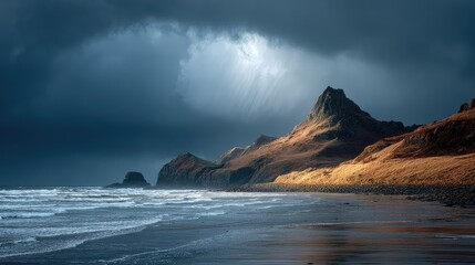 Obraz premium Dramatic coastal scene. Sunbeams pierce dark clouds over rugged, golden-hued hills meeting a stormy beach