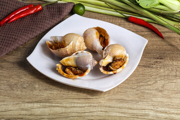 Snails baked with garlic and spices
