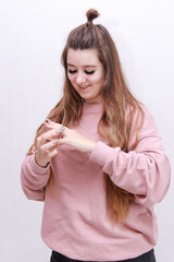 young woman showing thumbs up