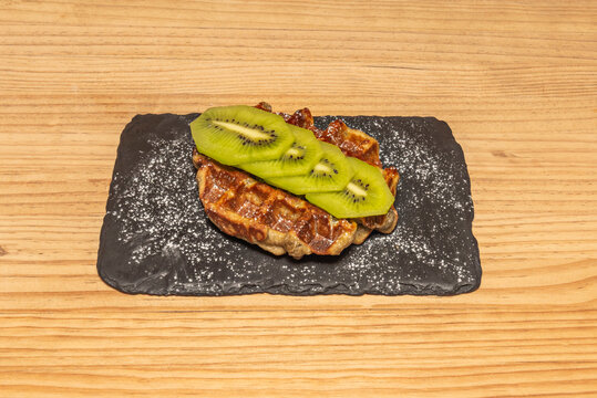 Fresh Sliced Strawberry Waffles: seasonal fruit macerated in powdered sugar - Powered by Adobe