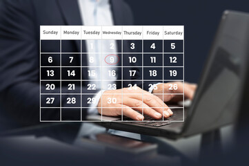 Time management concept. Calendar screen application with laptop. People manage time for effective work. Make an appointment, action plans, highlight reminders, and meeting agenda on the calendar. 
