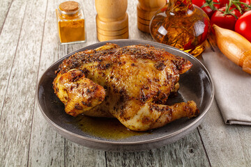 Baked in oven whole chicken with spices