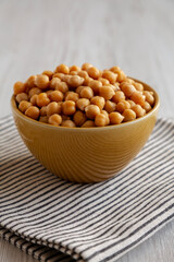 Organic Raw Canned Chickpeas in a Bowl, low angle view.