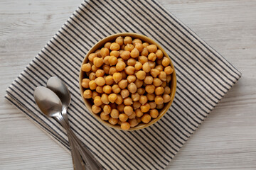 Organic Raw Canned Chickpeas in a Bowl, top view.