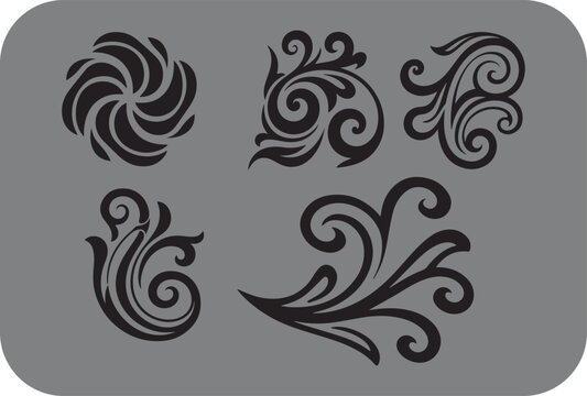 Collection of elegant black swirling floral and ornamental decorative elements on a muted gray background perfect for design inspiration