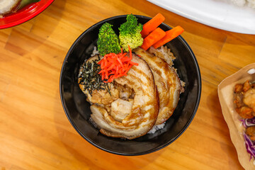Chashu pork rice bowl with vegetables
