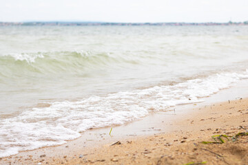 Gentle waves on a sandy beach