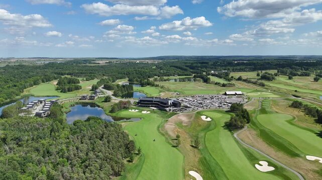 Aerial: TPC Toronto at Osprey Valley Golf Course during the day in Alton, Caledon, Ontario, Canada, orbit drone shot