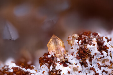 Orange Scorodite on white Phaunouxite. Specimen from Clara mine, oberwolfach, Germany. Micro photography extreme close-up. microscope mineral crystal photography for Scientific use. 