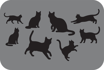 Collection of silhouettes of domestic cats in various poses and actions against a neutral gray background perfect for design elements