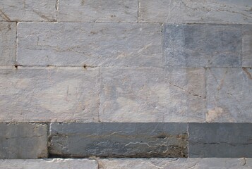 White rectangular marble stone wall texture, natural masonry background, marble tile surface, limestone cladding, decorative stone wall, horizontal stone blocks, rough stone surface, building facade.