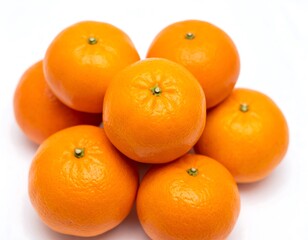 Fresh oranges clustered together