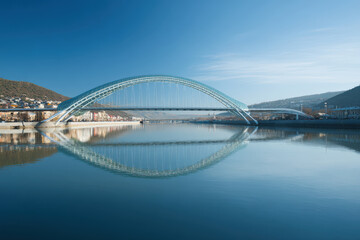Fototapeta premium stunning view of top cis cities featuring unique bridges and their reflections free of people