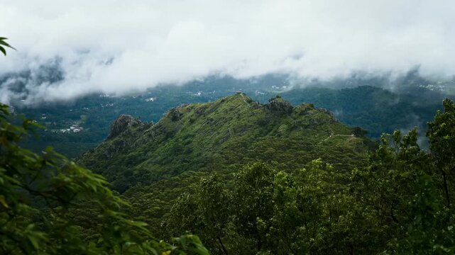 Timelapse video of Breathtaking hilltop scenery with rolling clouds over Ooty&rsquo;s natural landscape