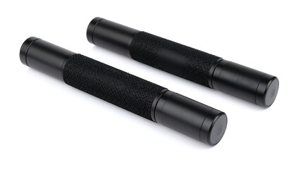 Pair of matte black metal cylinders with textured grips presenting industrial elegance