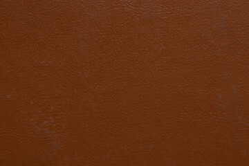 Dark brown synthetic leather with fine texture, old book cover for backgrounds
