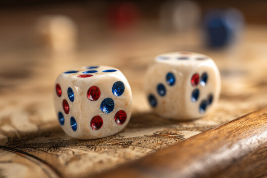 Dice on Backgammon Board: A close-up of two dice resting on a vintage backgammon board, game night.