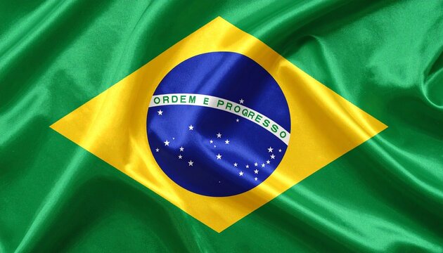 waving flag of brazil with yellow diamond, blue globe, and "Ordem e Progresso" motto