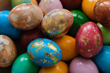 Colorful shiny Easter eggs close-up