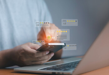 Customer review and rating system concept on a smartphone screen, showing star ratings and feedback for online services, representing digital reputation and user experience evaluation.