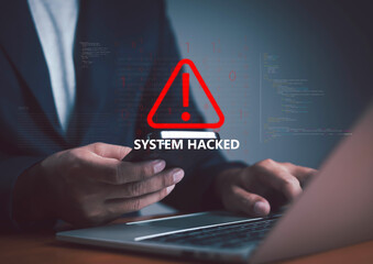 Cybersecurity breach alert with red exclamation mark and System Hacked warning on a digital interface above a laptop, representing hacking, data theft, and online security threats.