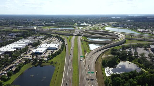 Winding Overpass Roads Of The Wekiva Parkway Connect to I-4 In Sanford, Florida, United States. Aerial Drone Shot