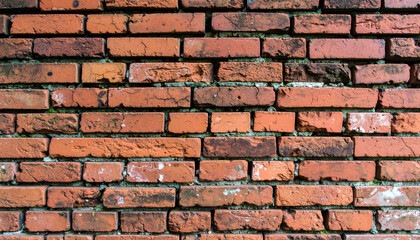 Obraz premium Old red brick wall texture with a rustic and weathered pattern