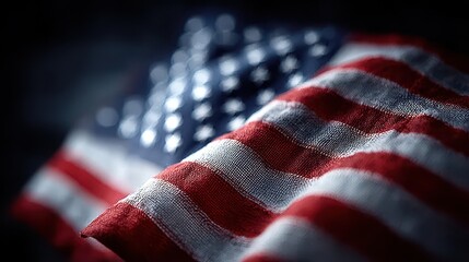 Close-up of American Flag with Red Stripes and Star Field, Dark Background