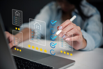 woman using a stylus to mark checkboxes and stars while evaluating real estate listings on her laptop. Virtual tools and digital ratings are used to assess the property.