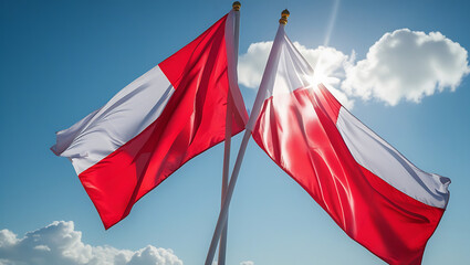 3d Canadian flag waving against a blue sky, Two flags (red and white) waving over a bright sky