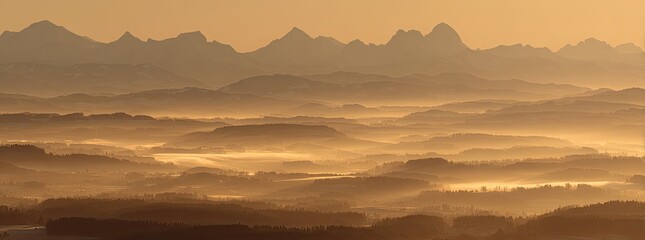Golden mist over mountain ranges