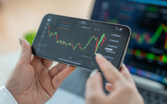 Business people with stock market chart financial trading, online investment, stock exchange analysis, market trends, real-time trading data, forex and crypto trading economic forecasting tool