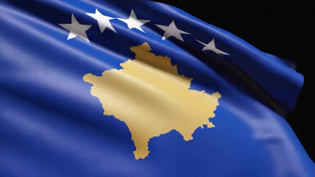 Dynamic Kosovo flag waves proudly with golden map and stars, symbolizing national pride and sovereignty in a powerful display.