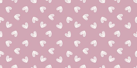 Seamless pattern with hand drawn heart on pink background. Abstract heart perfect for romantic, cute, and feminine design themes.