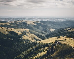Fototapeta premium Scenic rolling hills with a distant village