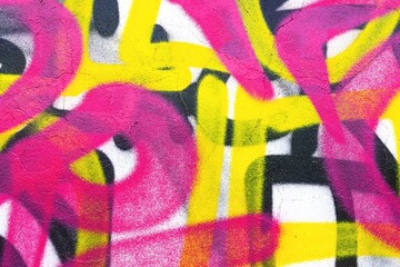 Graffiti street art in bright pink, yellow, black. Urban 90s, Y2K style, bold strokes, dynamic composition. Street murals, creative banners, youth culture visuals.