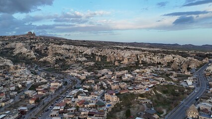 Fototapeta premium Aerial View of Unique Rock Formations and Fairy Chimneys in Cappadocia, Turkey