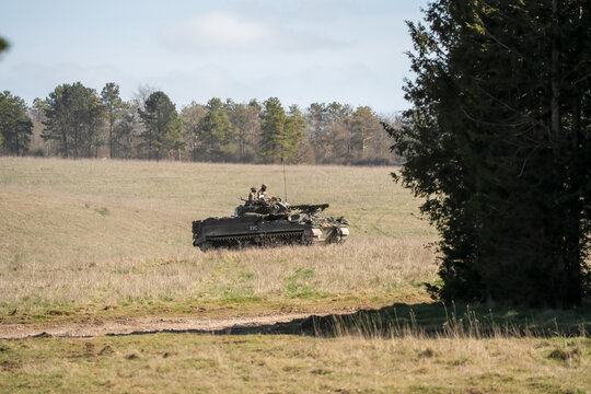 a British army Warrior FV510 IFV tank in action on a military exercise