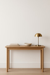 Naklejka premium Wooden console table with books and brass lamp in modern minimalist interior